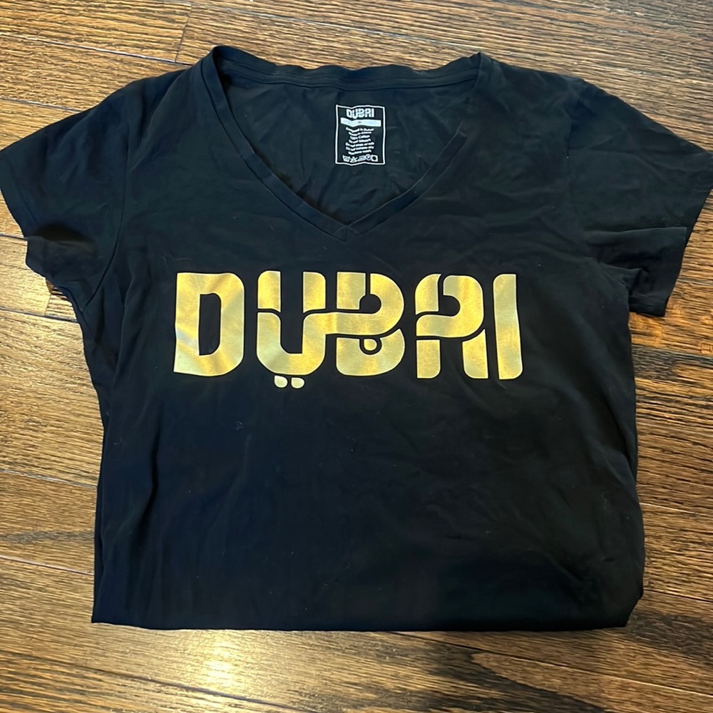T-shirt with gold writing